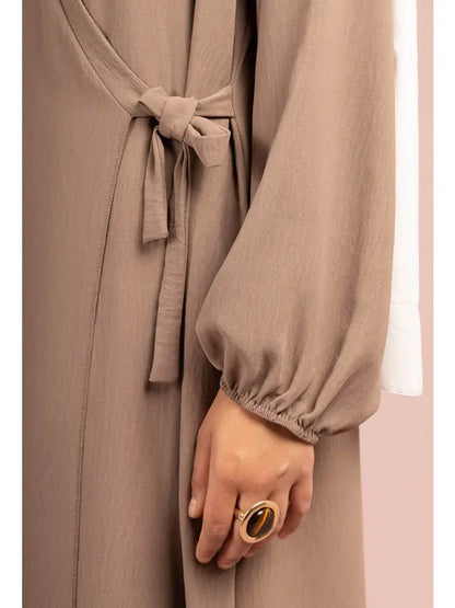 Abaya-jurk met strik en ballonmouwen